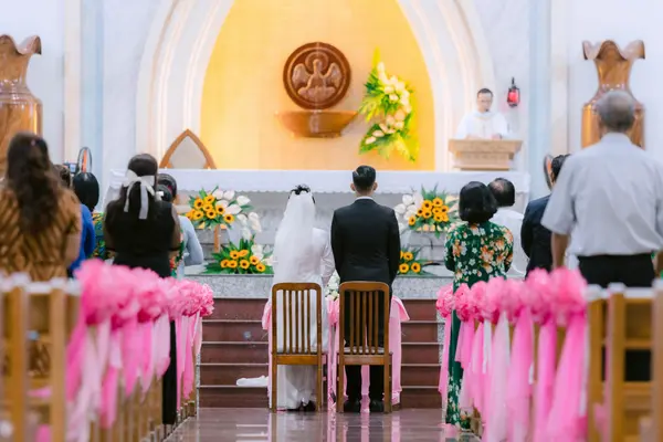 a wedding in progress inside a church from Concordia Lutheran Church houston in Houston, TX - church near me
