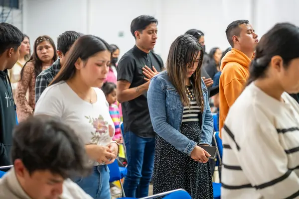 a youth group praying from Concordia Lutheran Church houston in Houston, TX - church near me