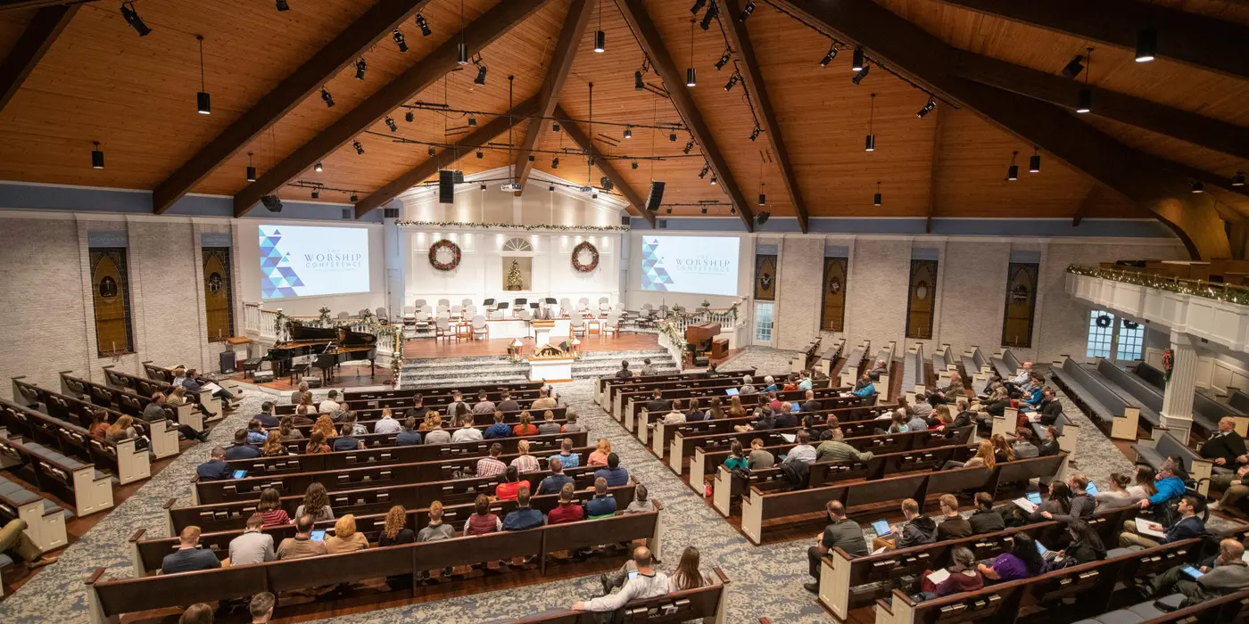 a large congregation listening to a minister sermon from Concordia Lutheran Church houston in Houston, TX - Special Kids Ministry