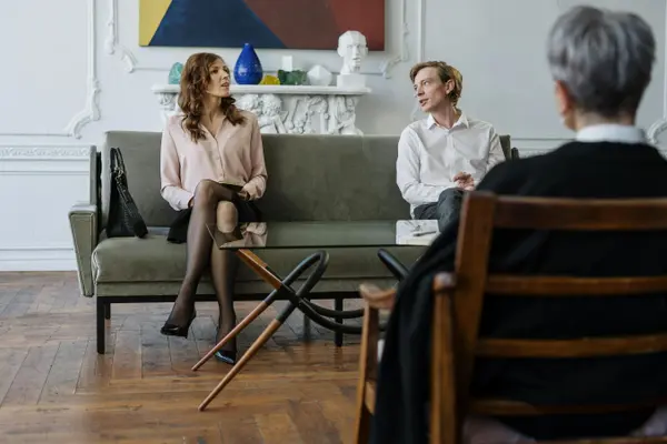 a minister counseling a married couple from Concordia Lutheran Church houston in Houston, TX - Youth Ministry